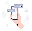 © WilliamCreates - A smartphone held in hand with store reviews.