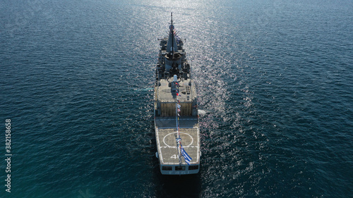 Fotomural Aerial drone photo of Hellenic Navy Frigate Navarinon anchored near port of Pi