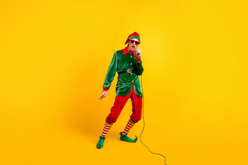 Canvas Print - Full length body size view of his he nice attractive cool talented famous funny guy elf star mc singing hit having fun celebratory isolated over bright vivid shine vibrant yellow color background