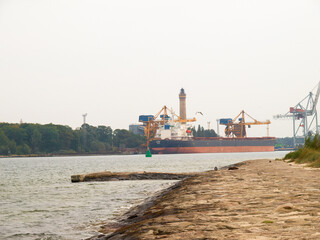 Wall Mural - View of the lighthouse and port in Swinoujscie, Poland