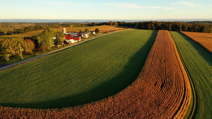 Countryside scenery at Fall season. Autumn colors. Harvest, harvesting time. Rural landscape. Aerial, view from above of the Farm