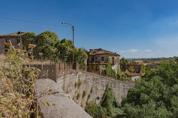 Apice Vecchio, a small ghost town in the province of Benevento. Wretched houses, collapsed buildings, closed and empty squares. Broken lanterns and abandoned shops