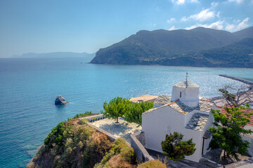 View of town and port at the island Skopelos, northern Sporades, Greece