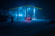 © MaaHoo Studio/Stocksy - Petrol station at night