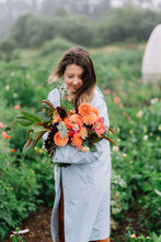 Woman Holding Beautiful Flowers Bouquet