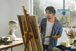 © MaaHoo Studio/Stocksy - Male artist woking in studio