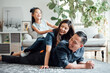 © MaaHoo Studio/Stocksy - Family at home