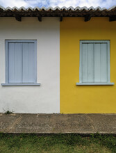 Yellow-white Wall With Blue Windows