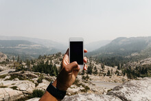 Taking An Mobile Phone Shot Of The Lake Tahoe Mountain Area.