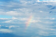 © Bisual Studio/Stocksy - A rainbow in the sky