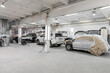 © Milles Studio/Stocksy - Modern vehicles in spacious garage