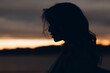 © primipil - Portrait profile of attractive young woman outside