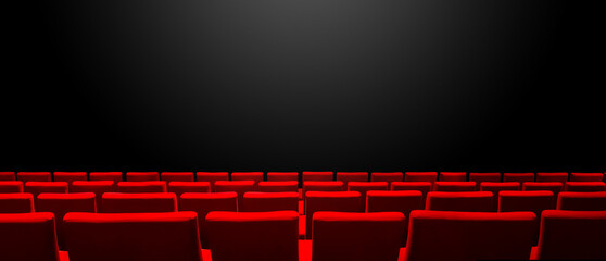 Canvas Print - Cinema movie theatre with red seats rows and a black background. Horizontal banner