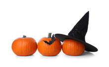 Orange Pumpkins With Witch Hat And Black Paper Bat Isolated On White. Halloween Decor