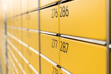 Wall Mural - Post office box. Yellow post box for rentals.