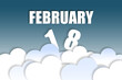 © SergeVo - february 18th. Day 18 of month,Month name and date floating in the air on beautiful blue sky background with fluffy clouds. winter month, day of the year concept