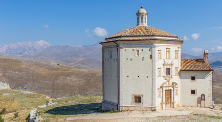 Wall Mural - Rocca Calascio, Italy - right beside the wonderful fortress of Rocca Calascio, and located on the top of a mountain, the Santa Maria della Pietà church displays a breathtaking view