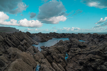 Wall Mural - Gower Peninsular Rhossilli Bay Causeway over to Worm Rock Formation at low tide