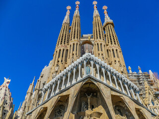 Wall Mural - The Sagrada Familia, is a huge Roman Catholic basilica in Barcelona, Spain designed by Antoni Gaudi and is a UNESCO World Heritage Site.