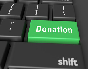 Donation concept. Word Donation on button of computer keyboard