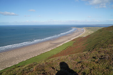 Wall Mural - Gower Peninsular Rhossilli Bay Panoramic with Green Hills surrounding the Sandy Bay - Green Welsh Hillsides