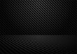 Abstract. Black carbon fiber background. light and shadow. Vector.