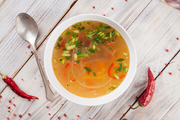 Wall Mural - Homemade vegetable soup with green onions