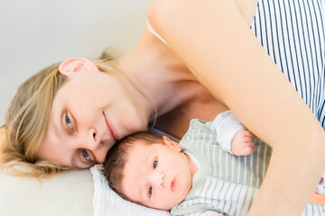 Happy mother with newborn baby