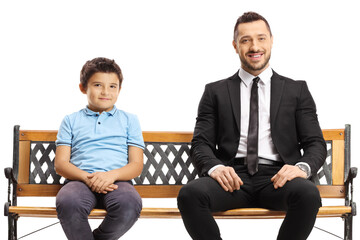 Wall Mural - Businessman and a boy sitting on a bench