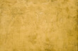 © Adrian Cotiga/Stocksy - Yellow wall texture