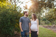 © Jakob Lagerstedt/Stocksy - Pregnant couple holding hands