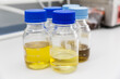 © Luis Cerdeira/Stocksy - Olive oil samples on glass jars ready to be analyzed