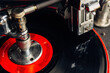 © Gabriel (Gabi) Bucataru/Stocksy - Spinning vinyl on an old record cutting machine