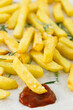 © Gourmet Photography/Stocksy - Chips/fries with sea salt and rosemary on newsprint