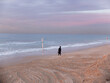 © Anna Malgina/Stocksy - An anonymous jewish orthodox man on beach in Tel-Aviv