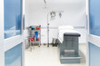 © Per Swantesson/Stocksy - Examination room with bed in a hospital