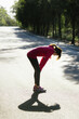 © MaaHoo Studio/Stocksy - Young woman taking a rest during jogging