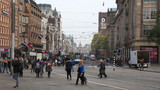 Fototapeta Miasto - Many people on Damrak street in Amsterdam.