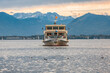 Tourist boat drives at Chiemsee in Bavaria, Germany.