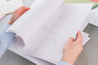 © DenisProduction.com - Business woman hands working with charts and diagrams. Female financial analyst working with documents.