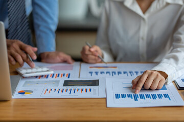 Team of business people working together in the meeting room office, teamwork background charts and graphs banner, double exposure successful teamwork,business planning concept.