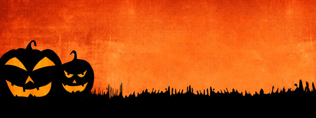 HALLOWEEN background banner wide panoramic panorama template -Silhouette of scary carved luminous cartoon pumpkins isolated on dark orange night texture