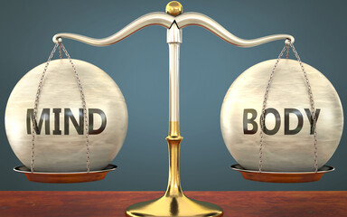 Wall Mural - metaphor of mind and body staying in balance - showed as a metal scale with weights and labels mind 