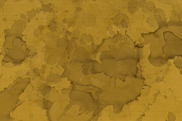 Vintage and old looking paper background. Colored gold with a brown retro book cover. Ancient book page.