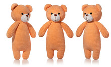 Knitted Toy. Orange Bear On White Background. Three Position. Full Depth Of Field. With Clipping Path.