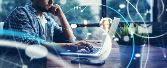 Wall Mural - male hands with laptop. man working remotely at home. concept of networking or remote work. global b