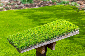 Sample of imitation artificial grass outside