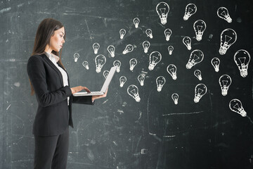 Wall Mural - businesswoman using laptop