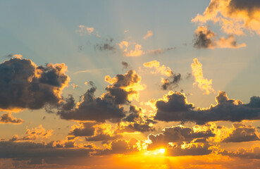 Wall Mural - a cloudy sunset landscape