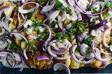 Fototapeta Lawenda - plant-based food, vegan potato bake with spanish onions and dairy-free cream cheese